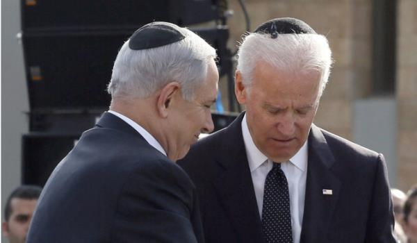 US President Joe Biden (R) shakes hand with Israeli Prime Minister Benjamin Netanyahu during an event at the Knesset in Jerusalem, on January 13, 2014. (AFP file photo)