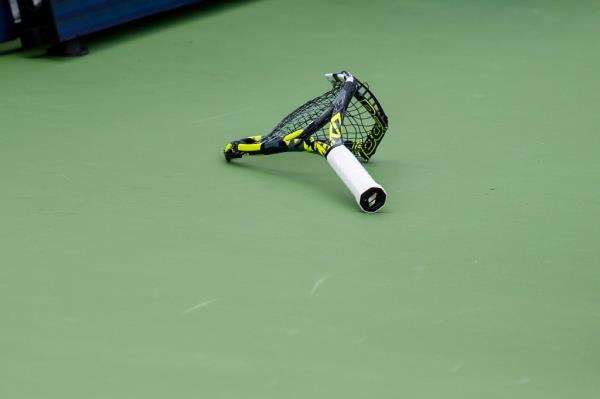 Carlos Alcaraz smashed his racket in frustration during an Aug. 16 match at the Cincinnati Open.