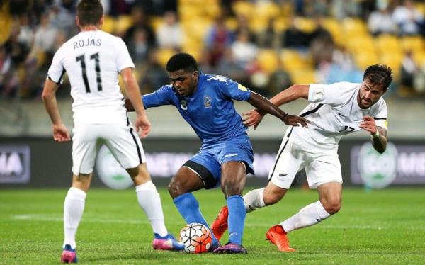 Setareki Hughes, middle, of Fiji against New Zealand in an international.