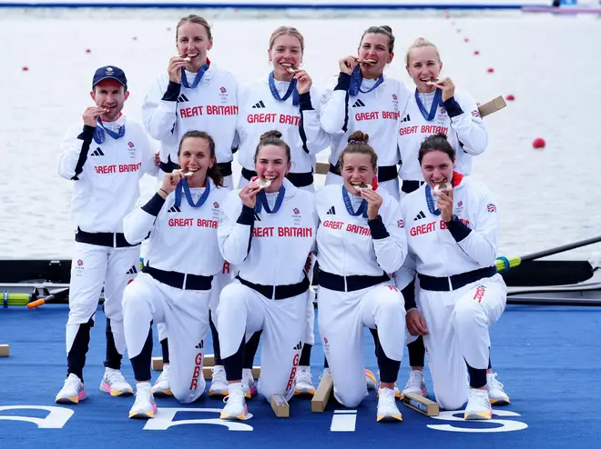 Great Britain's Heidi Long, Rowan McKellar, Holly Dunford, Emily Ford, Lauren Irwin, Eve Stewart, Harriet Taylor, Annie Campbell-Orde, and Cox Henry Fieldman with their bronze medals