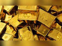 Gold prices inch lower as US rate cut bets cool