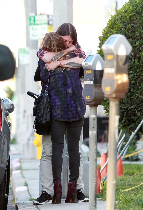 Dave Grohl and Jordyn Blum hugging in 2012.